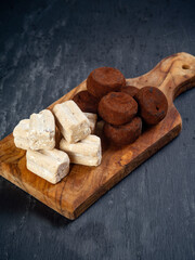 Italian tartufi on wood board