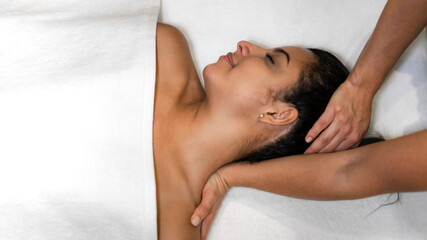 Fototapeta na wymiar Woman relaxing in a massage session