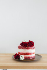 red velvet cake with fresh flowers on a Golden tray