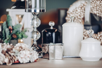 Festive table decorating by decorations and utensils. New Year eve concept