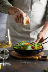 Man squeezing out lemon