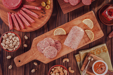 Slices of white pudding with pistachios, chestnut and smoked salami. Morcela branca - Top view