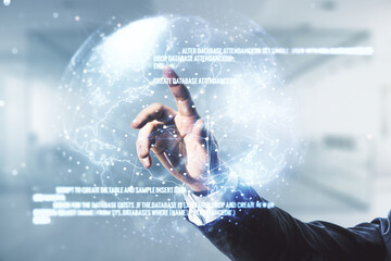 Multi exposure of developer's hand presses on abstract software development hologram and world map on blurred office background, global research and analytics concept