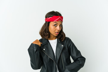 Young latin rocker woman isolated on white background