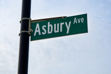 Obraz premium Asbury Park, NJ / United States - Oct. 11, 2020: closeup of the street sign for Asbury Avenue on the boardwalk.