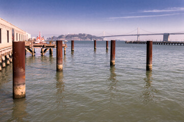 San Francisco, CA/USA - 2/1/2020: City of San Francisco, Port of San Francisco, Fishermans Wharf, with Bay Bridge