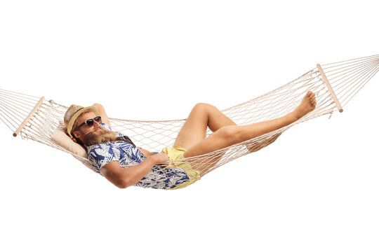 Bearded guy laying in a hammock swing