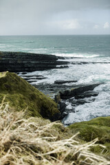 Waves crashing on rocks.