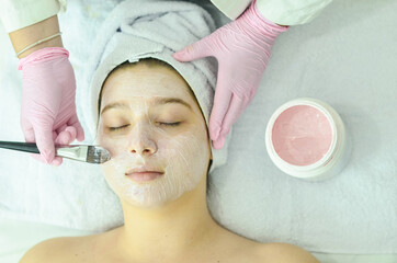 Facial therapy with pink clay