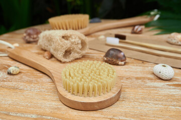 Fototapeta na wymiar Personal care products made from natural materials: body brushes, bamboo toothbrushes, Zero waste concept..