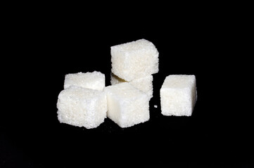 sugar isolated on black background