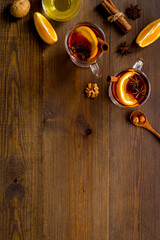 Christmas mulled wine with ingredients and Christmas decoration