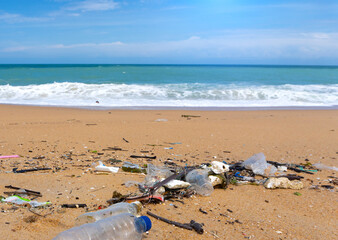 Fototapeta na wymiar Plastic bottle waste is an environmental pollution on the beach