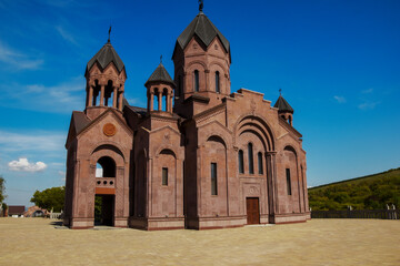 Russia. Anapa, Armenian Church September 18, 2020. Armenian Church Red Tuff. Beautiful stone church on the mountain, against the blue sky. License Editorial