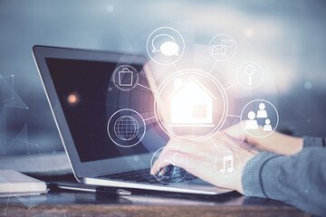 High tech city drawing with businessman working on computer on background. Smartcity concept. Double exposure.