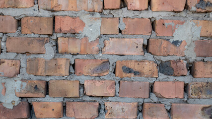 Texture of old casually constructed brick wall