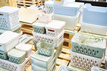 Plastic household containers in store
