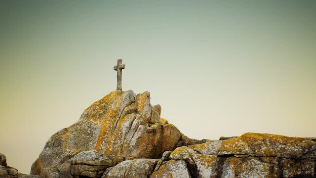 stone cross on the rock Beg Ar Groas