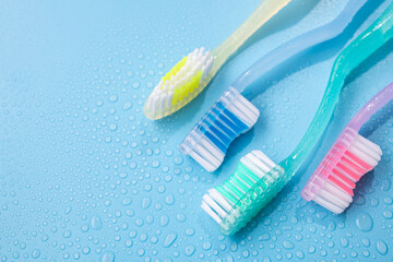 Colored toothbrushs with water drops