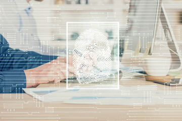 Fingerprint hologram with businessman working on computer on background. Security concept. Double exposure.
