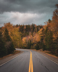 Fototapeta premium Autumn color on a road near Rangeley, Maine