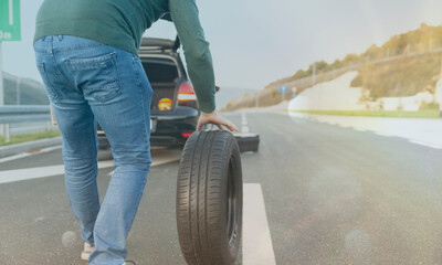 Obraz premium Problem with car, flat tire, highway 