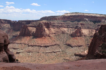 A scenic drive through a gorgeous desert landscape in Shafer Cayon, Canyonlands National Park, Utah