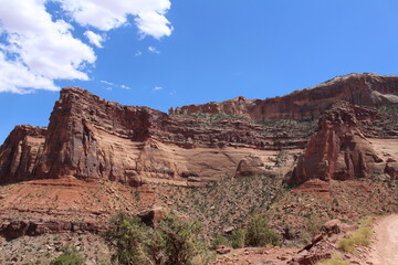 A scenic drive through a gorgeous desert landscape in Shafer Cayon, Canyonlands National Park, Utah