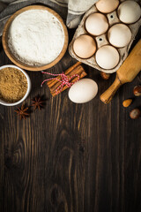 Baking ingredients on kitchen table.