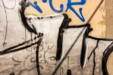 Colorful graffiti wall on street