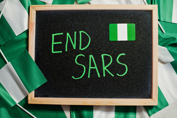 End SARS. Inscription of nigerian protest slogan.