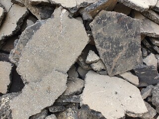 A mountain of pieces of old asphalt removed before the new asphalt was laid.