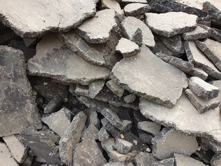 A mountain of pieces of old asphalt removed before the new asphalt was laid.