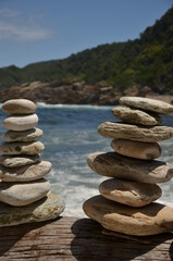 Stonemen in front of the ocean in the Tsitsikamma National Park in South Africa