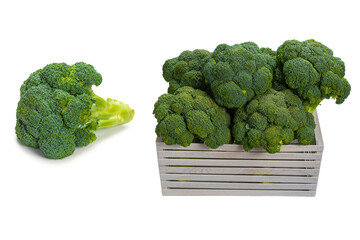 Fresh tasty broccoli in wooden box isolated