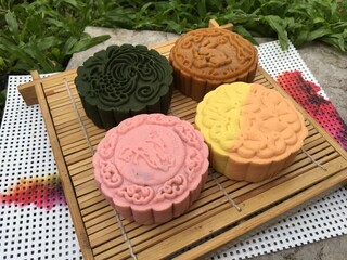 Peach moon cake, Yusu orange  moon cake, coffee mixed longan moon cake and walnut green tea moon cake