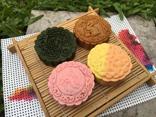 Peach moon cake, Yusu orange  moon cake, coffee mixed longan moon cake and walnut green tea moon cake