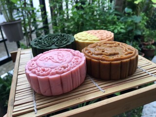 Peach moon cake, Yusu orange  moon cake, coffee mixed longan moon cake and walnut green tea moon cake