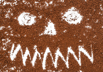 Coffee extravaganza - a scary, toothy face.