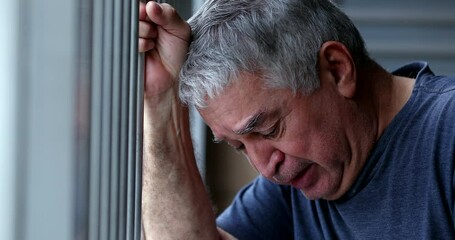 Older man feeling guilt and loneliness, senior retired person crying suffering with sorrow - Powered by Adobe