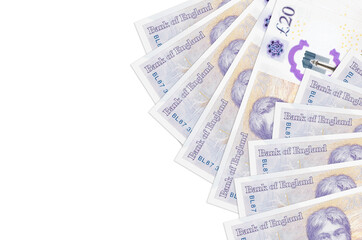 20 British pounds bills lies isolated on white background with copy space. Rich life conceptual...