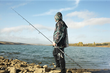 carp fishing on the lake shore with tackle