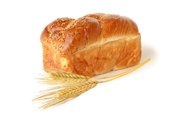 Mini loaf of bread with wheat of spikelets isolated on white
