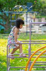 Obraz premium happy asian children playing in playground