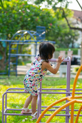 happy asian children playing in playground