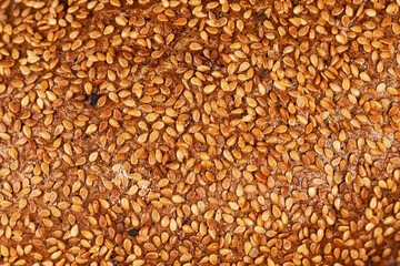 Obraz premium Close-up shot of loaf bread surface. The texture of bread. Copy space