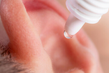 Ear drops. The use of medicines to treat ear diseases