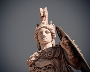 Athena ancient Greek goddess marble statue detail on plain background