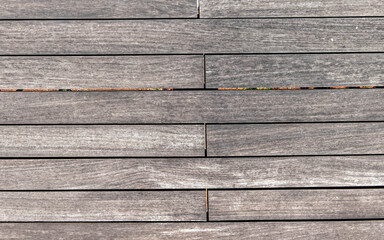 Obraz premium natural greyed wood dock planks top view closeup, textured pattern background