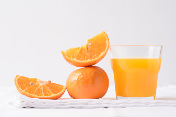Fresh orange fruit on white background